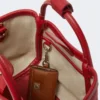 Ekstra lille marine taske i raffia-look med kurveflet, rød