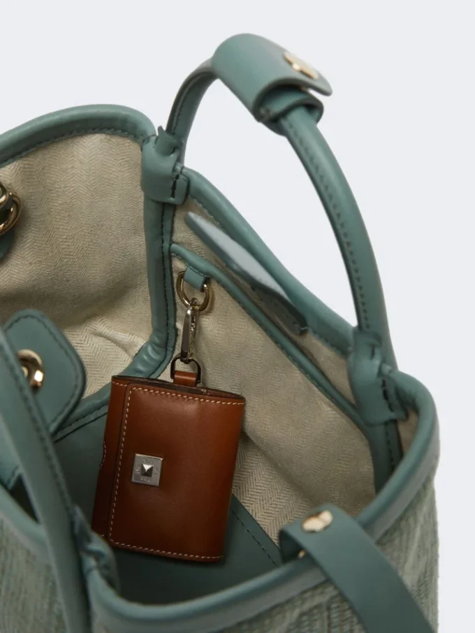 Ekstra lille marine taske i raffia-look med kurveflet, salviegrøn Ekstra lille marine taske i raffia-look med kurveflet, salviegrøn