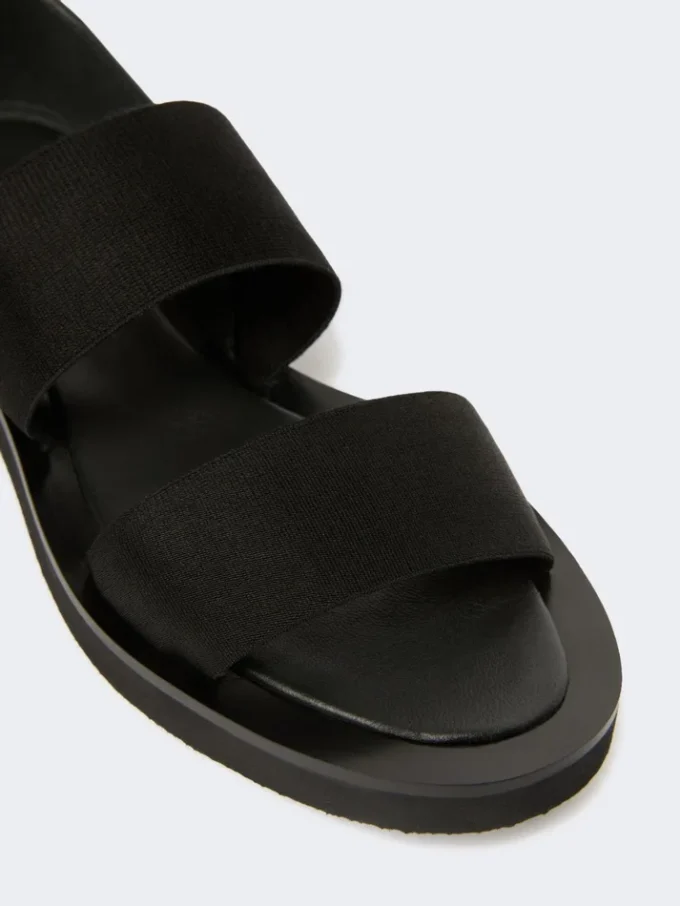 Flade sandaler i læder og elastisk bånd, sort Flade sandaler i læder og elastisk bånd, sort