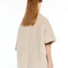 Kappe i alpaca og uld-teddy-stof, beige Kappe i alpaca og uld-teddy-stof, beige