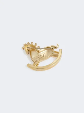 Metalbroche med rhinestones, rød