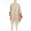 Poncho i jacquarduld, beige Poncho i jacquarduld, beige