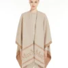 Poncho i jacquarduld, beige Poncho i jacquarduld, beige