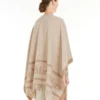 Poncho i jacquarduld, beige Poncho i jacquarduld, beige